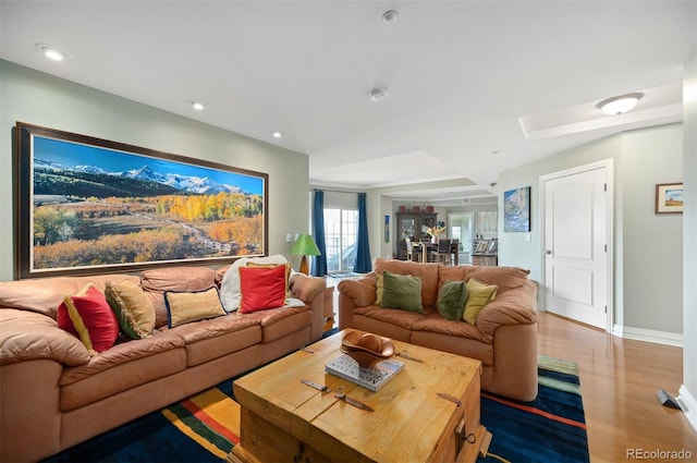300 W 11th Ave Unit 15F, Denver, CO 80204 - living area with wood finished floors, baseboards, and recessed lighting