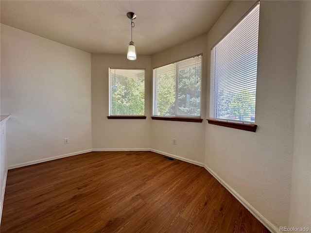 13191 Umatilla St, Denver, CO 80234 - empty room featuring wood finished floors and baseboards