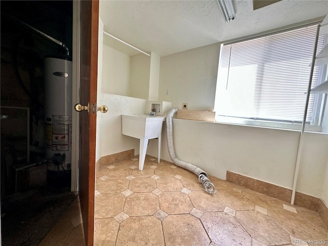 13191 Umatilla St, Denver, CO 80234 - bathroom with water heater and a textured ceiling