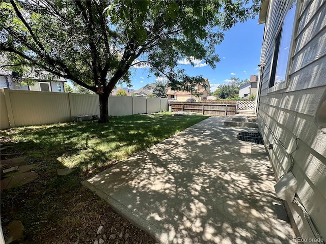 13191 Umatilla St, Denver, CO 80234 - fenced backyard featuring a patio area