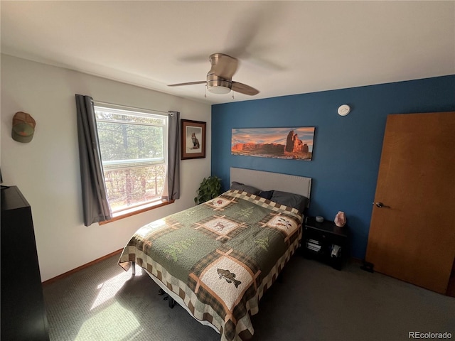 bedroom featuring baseboards, carpet flooring, and ceiling fan