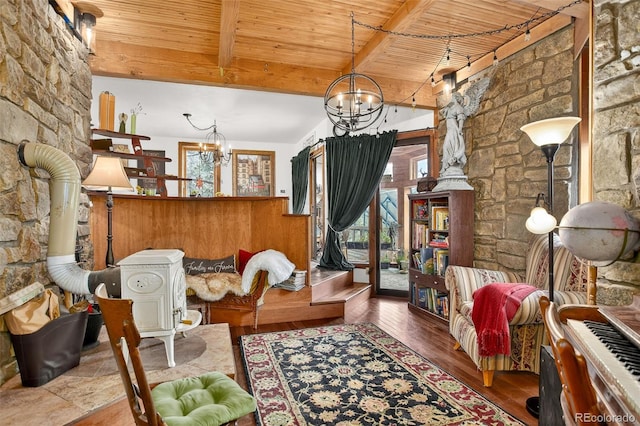 1575 York Gulch Rd, Idaho Springs, CO 80452 - living area featuring a chandelier, wood finished floors, and a wooden ceiling with exposed beams
