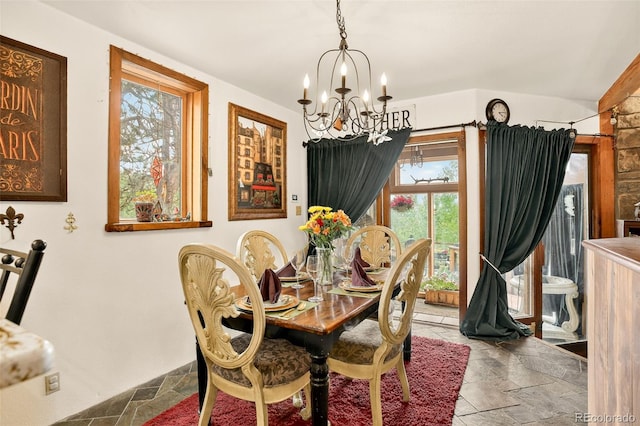 1575 York Gulch Rd, Idaho Springs, CO 80452 - dining room with stone tile flooring and a chandelier