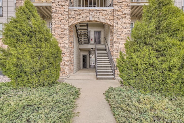 7292 S Blackhawk St Unit 2-204, Englewood, CO 80112 - view of exterior entry featuring stone siding