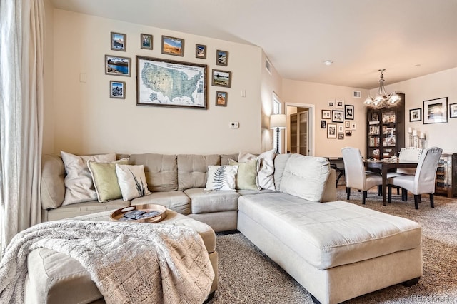 7292 S Blackhawk St Unit 2-204, Englewood, CO 80112 - carpeted living area featuring a chandelier