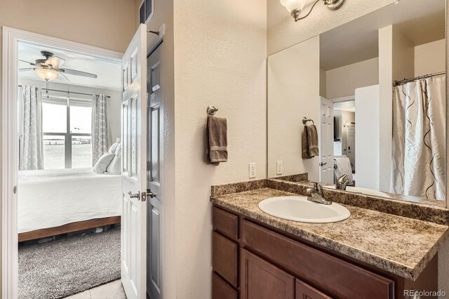 7292 S Blackhawk St Unit 2-204, Englewood, CO 80112 - full bath with ensuite bathroom, a ceiling fan, and vanity