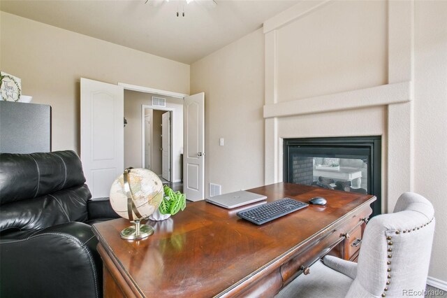 office space featuring a multi sided fireplace