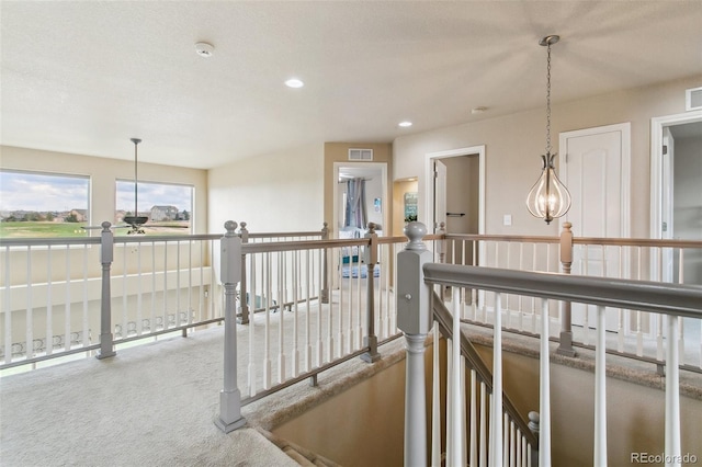 corridor with recessed lighting and carpet floors