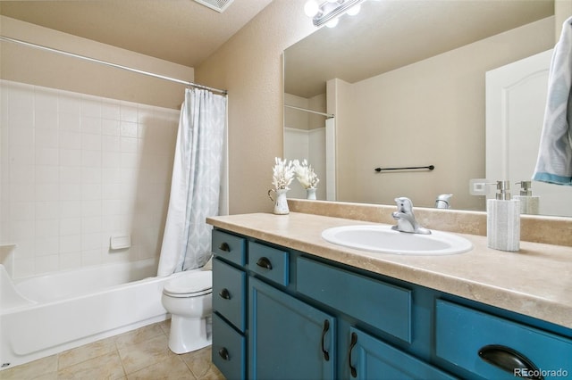 bathroom featuring toilet, tile patterned floors, vanity, and shower / bath combination with curtain