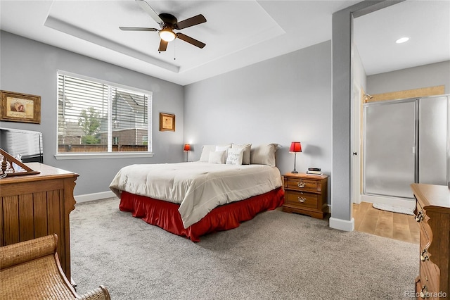 484 N Jamestown Way, Aurora, CO 80018 - bedroom with carpet flooring, baseboards, a raised ceiling, and ceiling fan