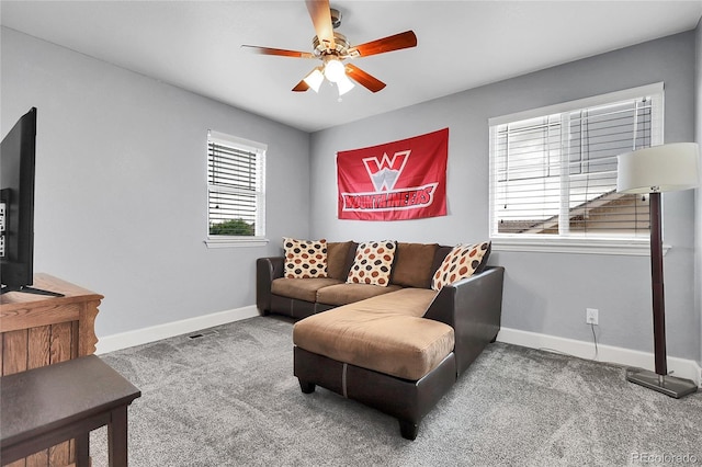 484 N Jamestown Way, Aurora, CO 80018 - carpeted living area featuring ceiling fan and baseboards