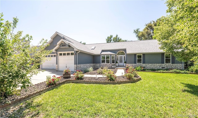 995 Chase St, Lakewood, CO 80214 - ranch-style house featuring stone siding, an attached garage, a front yard, and driveway