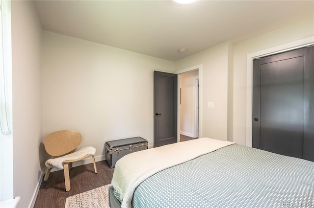 995 Chase St, Lakewood, CO 80214 - bedroom with baseboards and wood finished floors