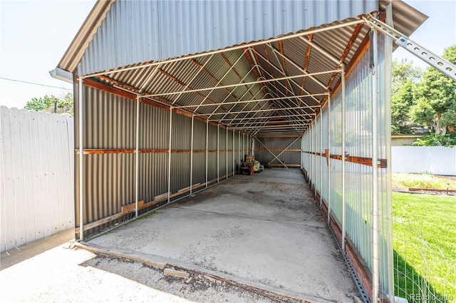 995 Chase St, Lakewood, CO 80214 - view of car parking featuring an exterior structure