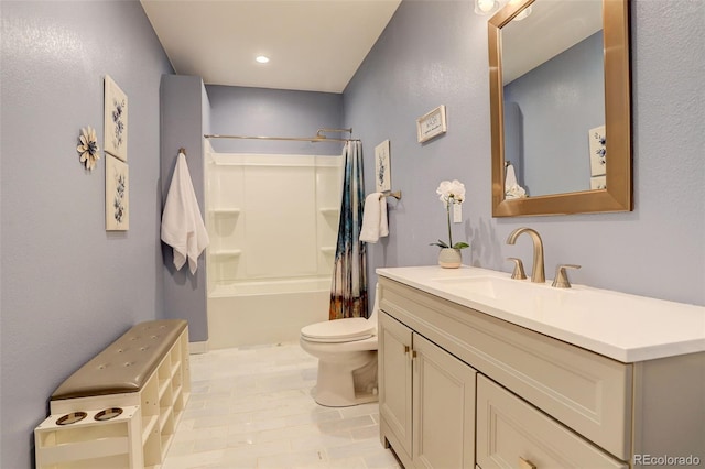 bathroom with toilet, shower / tub combo, and vanity