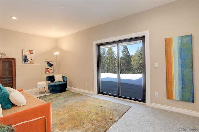 bedroom with access to outside, baseboards, and carpet flooring