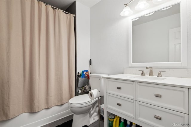 full bathroom featuring vanity, toilet, and shower / tub combo