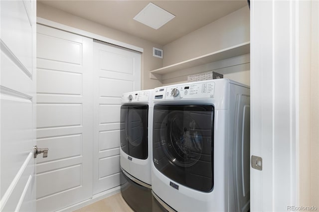 laundry room with washer and clothes dryer