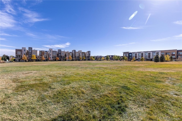 surrounding community with a yard