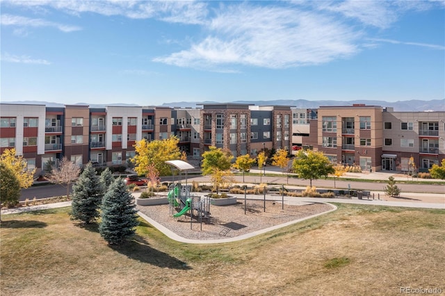 surrounding community with a mountain view