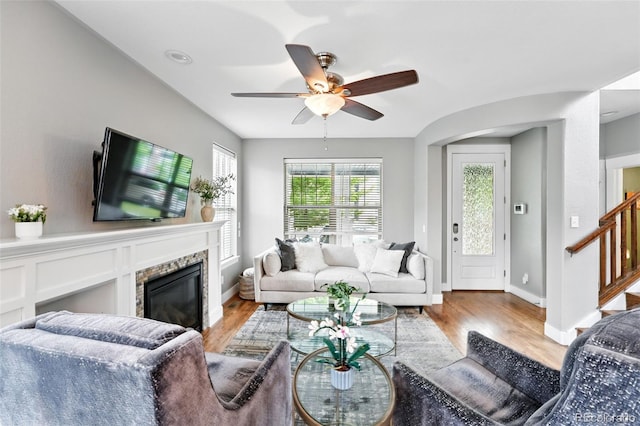 3644 Wabash St, Denver, CO 80238 - living area with light wood-type flooring, a ceiling fan, and baseboards