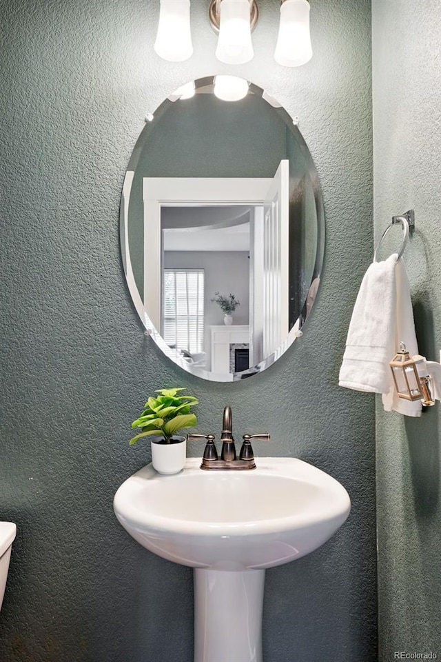 3644 Wabash St, Denver, CO 80238 - half bathroom with toilet and a sink