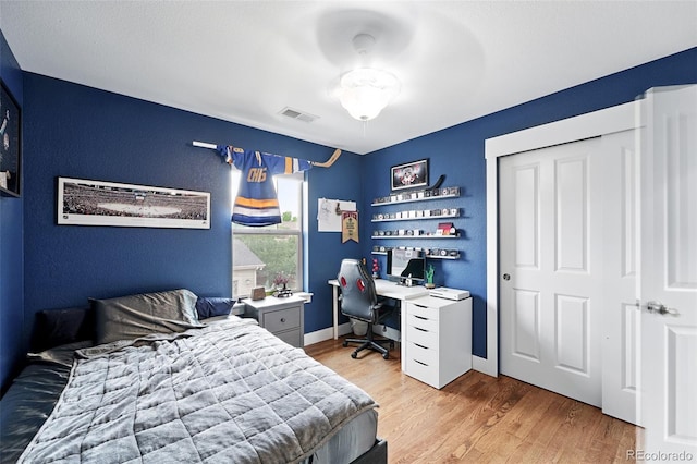 3644 Wabash St, Denver, CO 80238 - bedroom with light wood finished floors, a desk, and baseboards