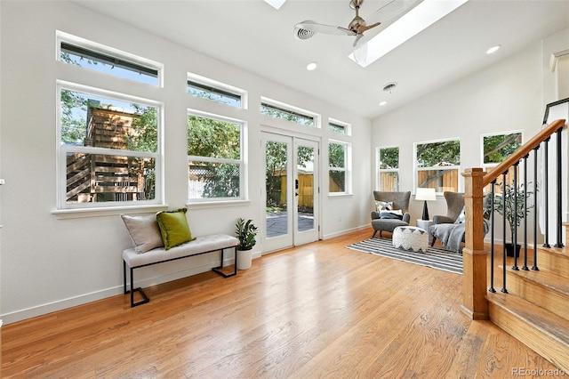 554 S Logan St, Denver, CO 80209 - sitting room with a skylight, healthy amount of natural light, french doors, wood finished floors, and recessed lighting