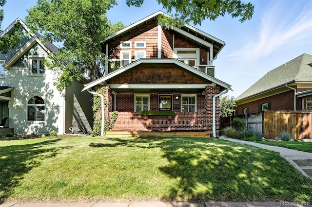 554 S Logan St, Denver, CO 80209 - craftsman-style house with brick siding and a porch