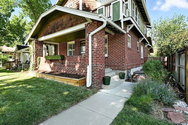 554 S Logan St, Denver, CO 80209 - view of side of home featuring brick siding