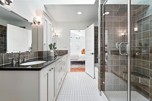 554 S Logan St, Denver, CO 80209 - ensuite bathroom with vanity, a shower stall, and recessed lighting