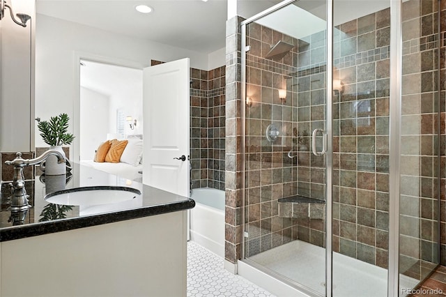 554 S Logan St, Denver, CO 80209 - full bath with vanity, a shower stall, recessed lighting, and a bath