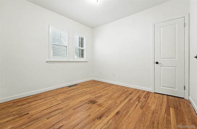 554 S Logan St, Denver, CO 80209 - unfurnished room featuring light wood finished floors and baseboards