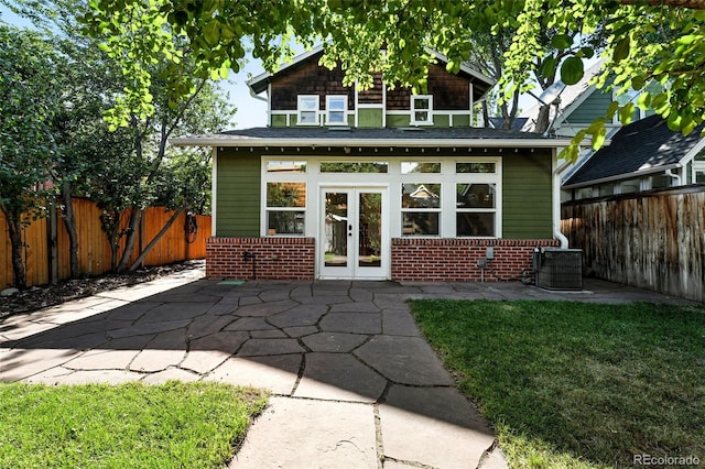 554 S Logan St, Denver, CO 80209 - view of outdoor structure with french doors and a fenced backyard