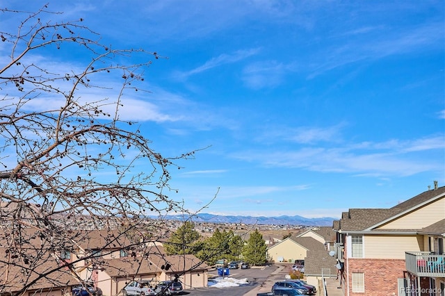 property view of mountains featuring a residential view