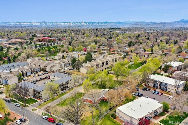 birds eye view of property featuring a mountain view and a residential view
