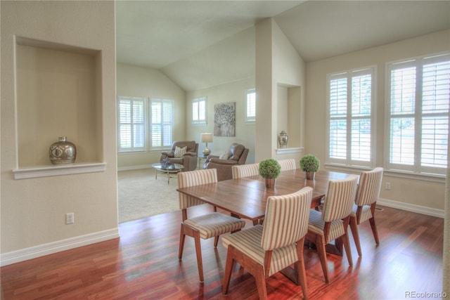 8594 W Quarto Ave, Littleton, CO 80128 - dining area featuring lofted ceiling and wood finished floors