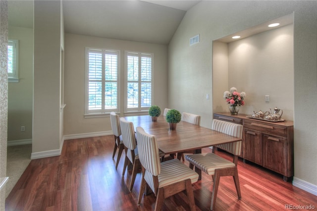8594 W Quarto Ave, Littleton, CO 80128 - dining area featuring lofted ceiling and wood finished floors