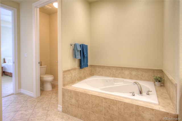 8594 W Quarto Ave, Littleton, CO 80128 - ensuite bathroom with a garden tub and tile patterned flooring