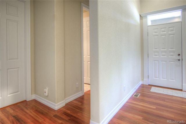 8594 W Quarto Ave, Littleton, CO 80128 - entrance foyer featuring wood finished floors and baseboards
