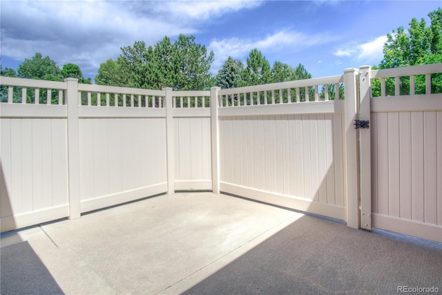 8594 W Quarto Ave, Littleton, CO 80128 - gate featuring a patio