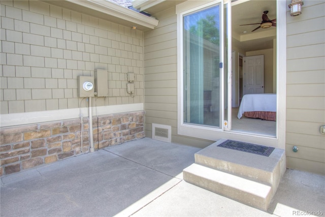 8594 W Quarto Ave, Littleton, CO 80128 - doorway to property with a patio area