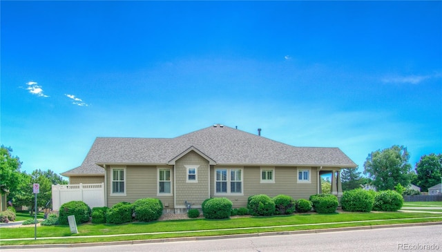 8594 W Quarto Ave, Littleton, CO 80128 - view of property exterior with a shingled roof