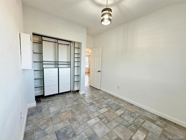 unfurnished bedroom featuring a closet