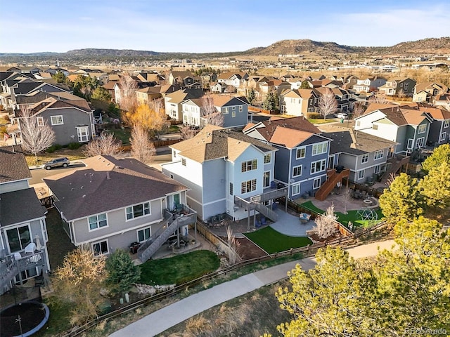 aerial perspective of suburban area with a mountain backdrop