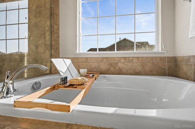 bathroom featuring a bath