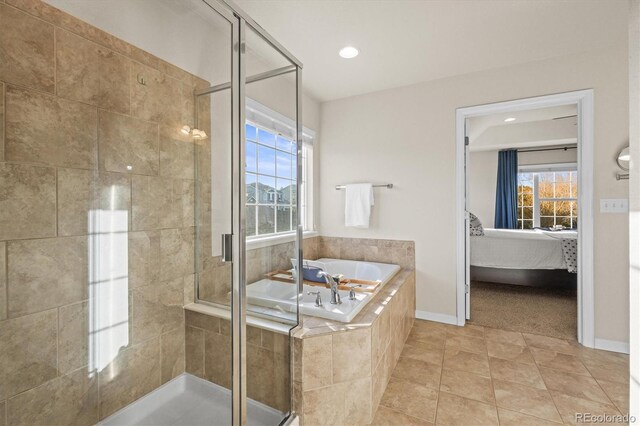 full bath featuring ensuite bathroom, a stall shower, a bath, tile patterned floors, and recessed lighting