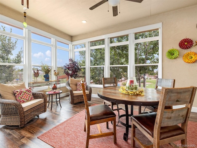 sunroom with ceiling fan