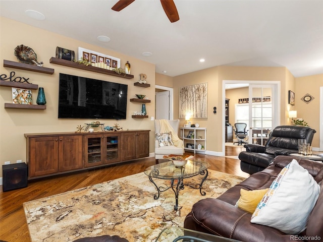 living room with dark wood finished floors, recessed lighting, a ceiling fan, and baseboards