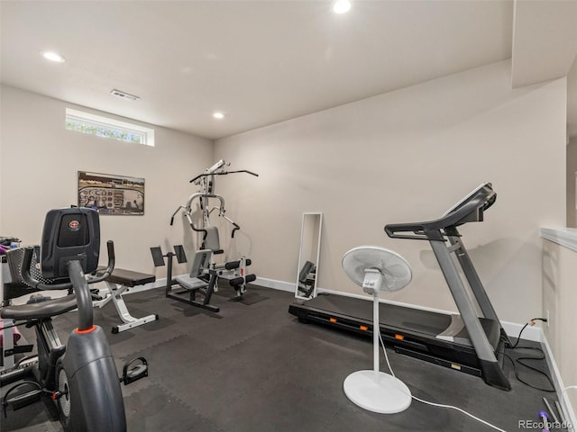 workout area featuring recessed lighting, baseboards, and visible vents